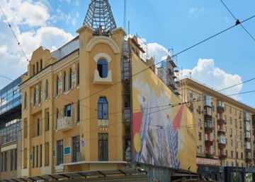 В новом Доме недвижимости уже выполняют облицовочные работы