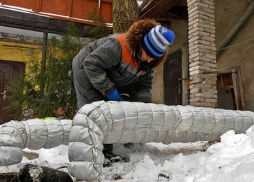 «Харьковские тепловые сети» изолируют трубопроводы для сохранения тепла