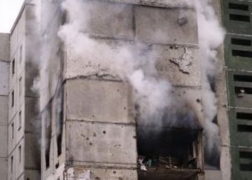 Из-за обстрелов в Харькове обрушился подъезд жилого дома Из-за обстрелов в Харькове обрушился подъезд жилого дома