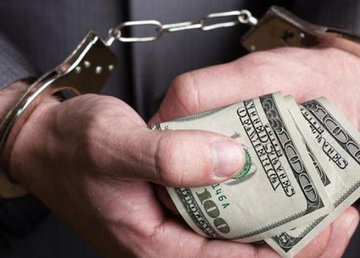 На Харьковщине полицейские разоблачили мужчину в вымогательстве более 26 000 долларов США у женщины 